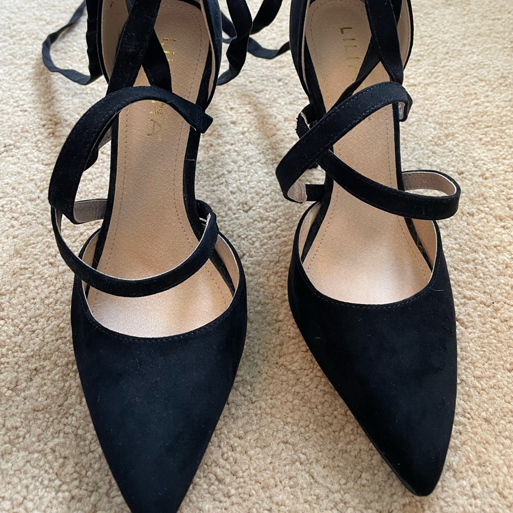 Liliana black heels with strap up ties. Straps wrap around to about mid calf.